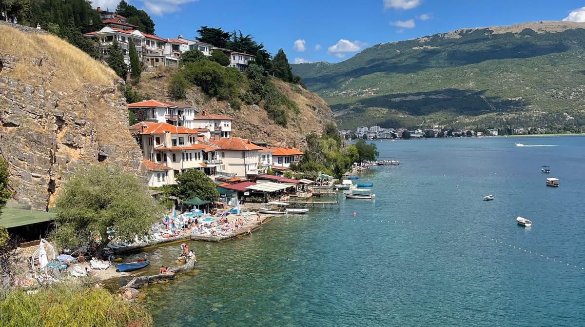 Turquoise water and boats along the shore at Kaneo on Lake Ohrid