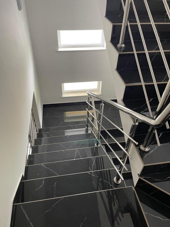 Elegant dark staircase inside the building